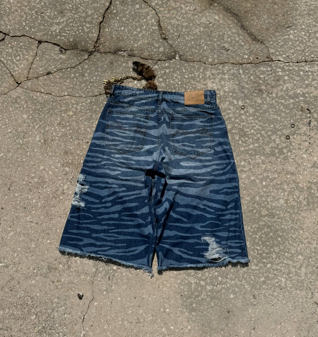 Blue denim tiger stripe shorts